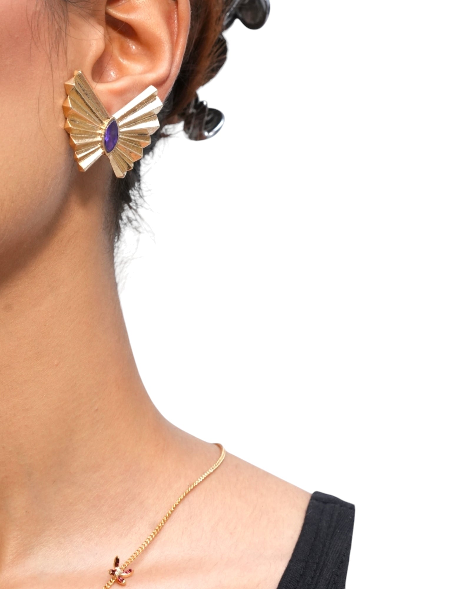 Model wearing Flora Studs from SU Jewelry’s Soffio Collection

