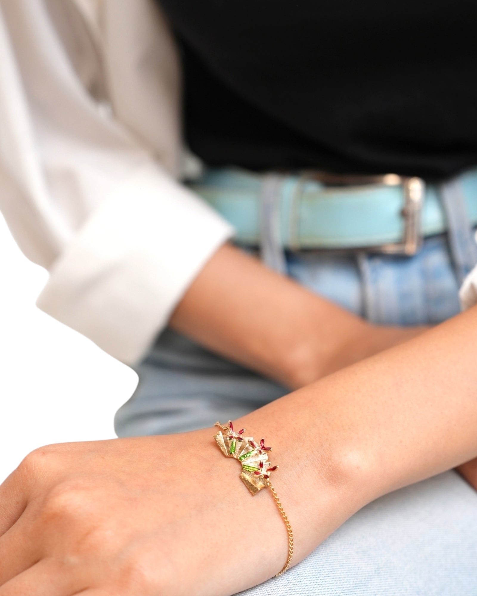 Close-up of Rossi Bracelet showing fan-like folds and enamel accents

