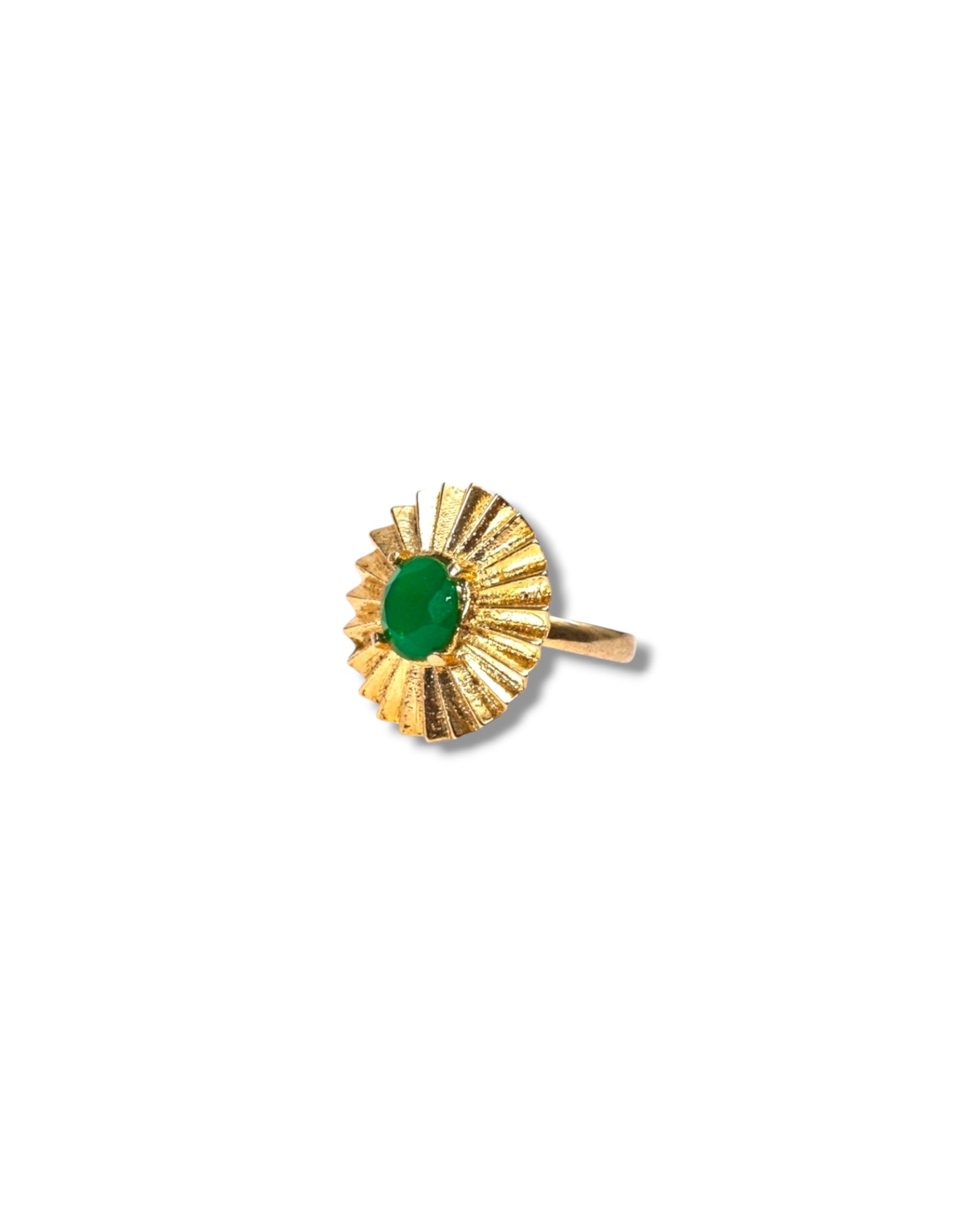 sideview of Verde Ring featuring fan-inspired design and green gemstone

