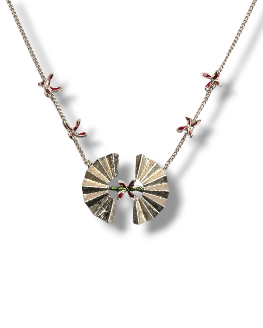 front view of Argento Pendant featuring floral enamel details

