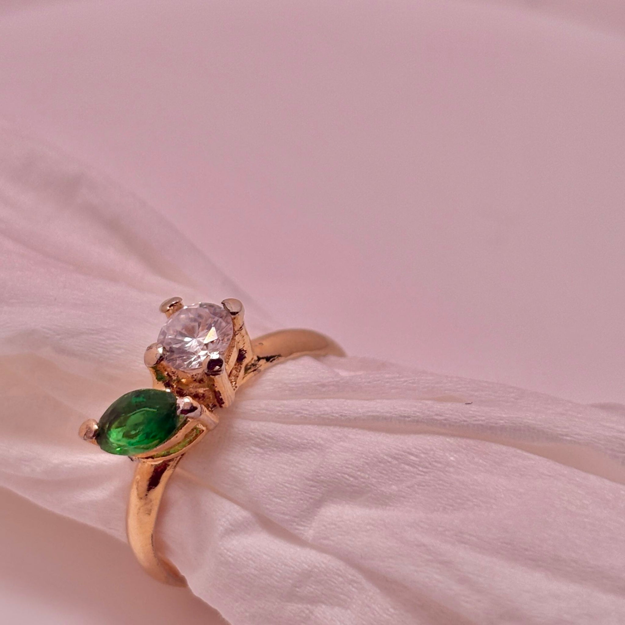 3. Birthstone-inspired white and green ring from Bonded Cut Collection
